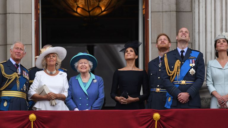 The royals watch the flypast from the balcony of Buckingham Palace