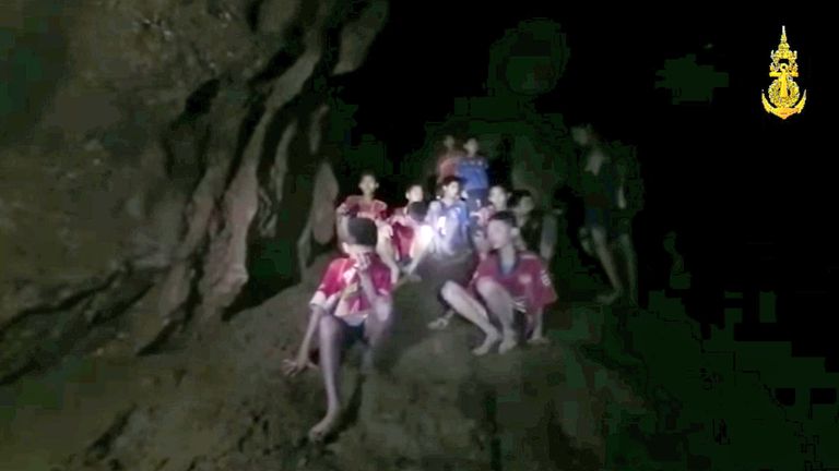 Boys from an under-16 soccer team and their coach wait to be rescued after they were trapped inside a flooded cave in Chiang Rai, Thailand