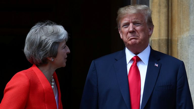 Theresa May poses for a photograph with U.S. President Donald Trump at Chequers 