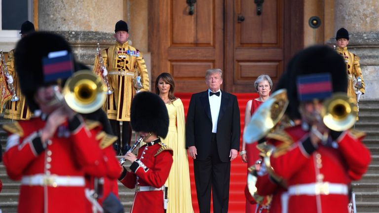 US President Donald Trump and US First Lady Melania Trump stand with Prime Minister Theresa May