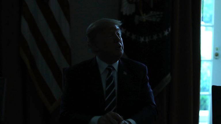  The lights temporally go out in the Cabinet Room while U.S. President Donald Trump talks the media about his meeting with Vladimir Putin