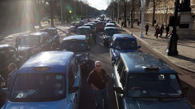 Black cab drivers take part in a strike to protest against Uber in  2016