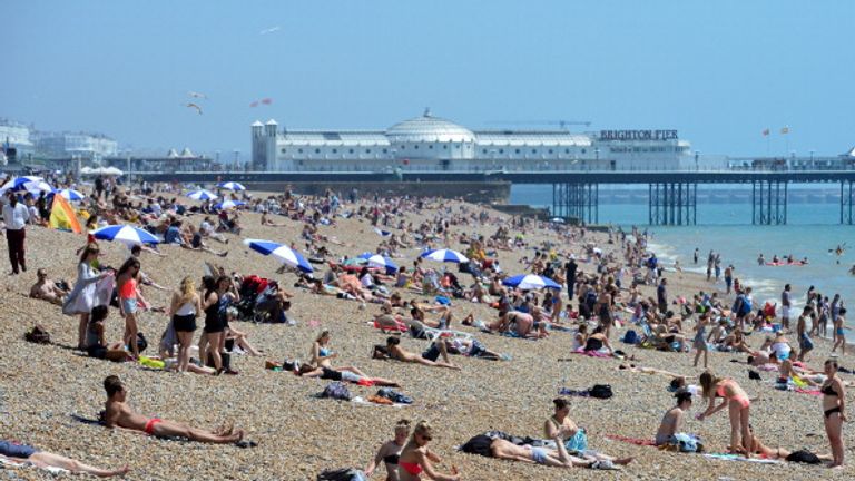 Bin lorry sinks into tarmac as UK swelters in heatwave | UK News | Sky News