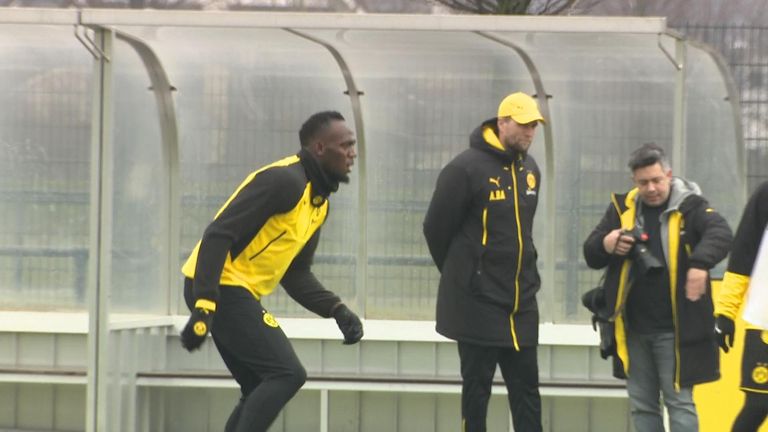 Usain Bolt trains with the Australian football team
