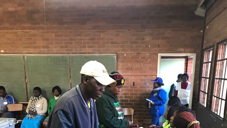 Voters cast their ballots in Kuwadzana, near Harare