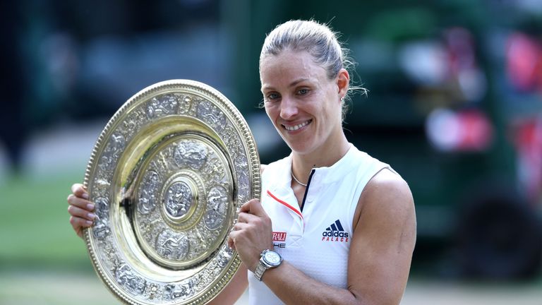 Angelique Kerber of Germany poses with the Venus Rosewater Dish after defeating Serena Williams of The United States in the Ladies&#39; Singles final on day twelve of the Wimbledon Lawn Tennis Championships at All England Lawn Tennis and Croquet Club on July 14, 2018 in London, England.