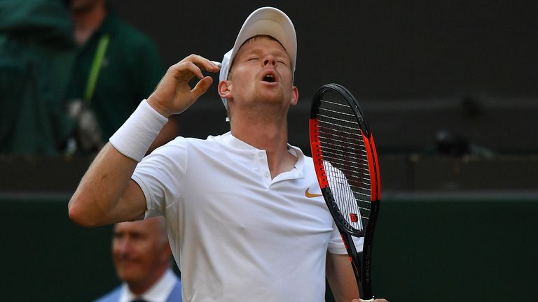 Britain&#39;s Kyle Edmund reacts after losing a point against Serbia&#39;s Novak Djokovic during their men&#39;s singles third round match on the sixth day of the 2018 Wimbledon Championships at The All England Lawn Tennis Club in Wimbledon, southwest London, on July 7, 2018.