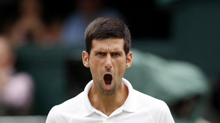 Serbia&#39;s Novak Djokovic reacts against Spain&#39;s Rafael Nadal during the continuation of their men&#39;s singles semi-final match on the twelfth day of the 2018 Wimbledon Championships at The All England Lawn Tennis Club in Wimbledon, southwest London, on July 14, 2018.