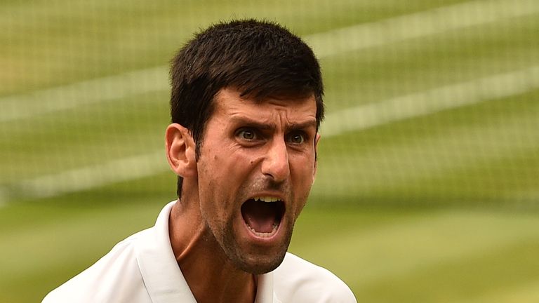 Novak Djokovic reacts during the Wimbledon semi-final against Rafael Nadal