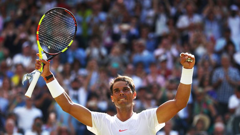 Rafael Nadal celebrates after beating Dudi Sela in straight sets at Wimbledon