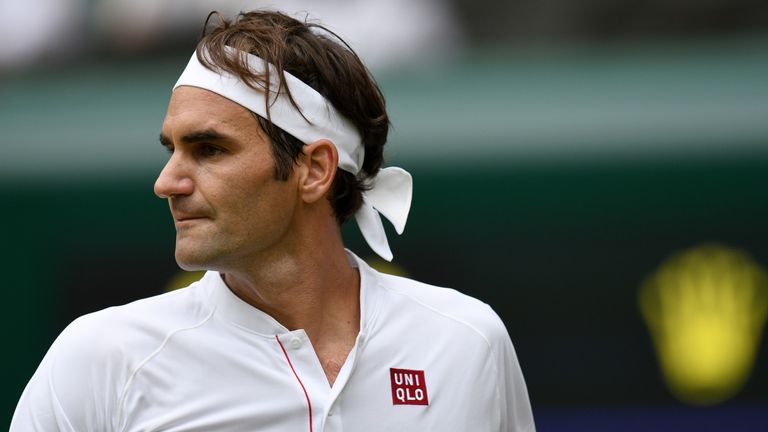 Switzerland&#39;s Roger Federer reacts against Slovakia&#39;s Lukas Lacko during their men&#39;s singles second round match on the third day of the 2018 Wimbledon Championships at The All England Lawn Tennis Club in Wimbledon, southwest London, on July 4, 2018. 