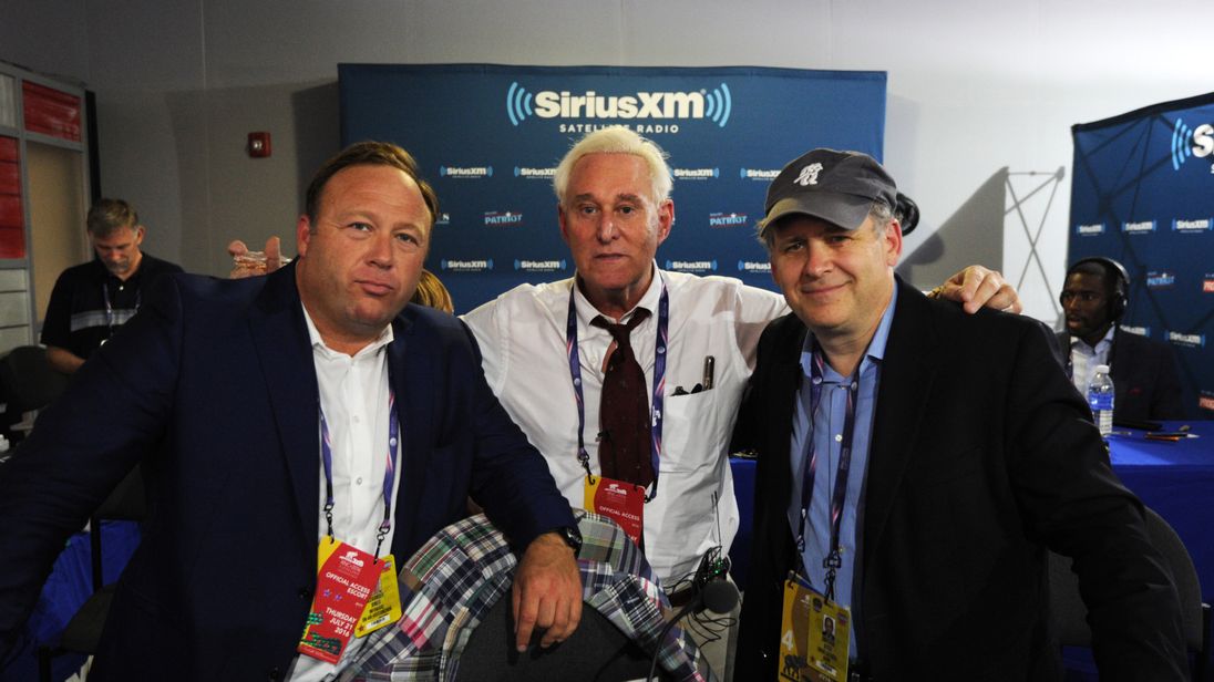 CLEVELAND, OH - JULY 21: Alex Stone, of Infowars, Roger Stone, former Donald Trump advisor, and Jonathan Alter pose for a photo following an episode of Alter Family Politics on SiriusXM at Quicken Loans Arena on July 20, 2016 in Cleveland, Ohio. (Photo by Ben Jackson/Getty Images for SiriusXM)
