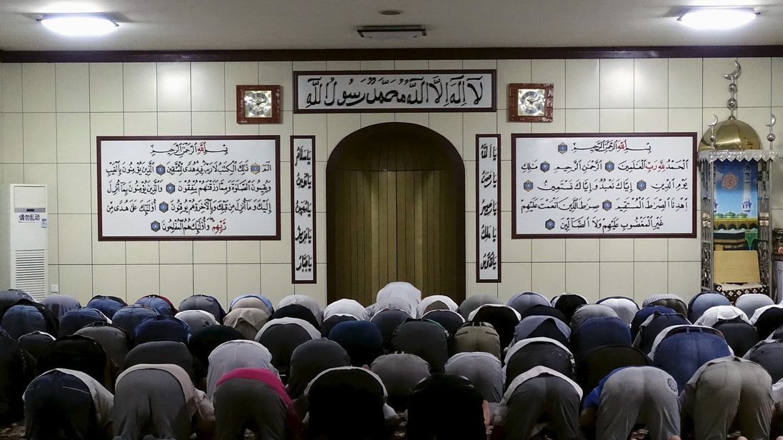 Muslims pray at a mosque during Ramadan in Urumqi, Xinjiang