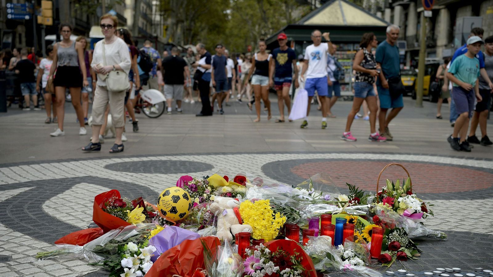 Catalan separatists stage protest as crowds remember Barcelona terror
