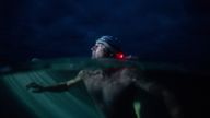 Renowned endurance swimmer and United Nation...s Environment Programme (UNEP)...s Patron of the Oceans, Lewis Pugh swims past Start Point, United Kingdom during The Long Swim campaign on 27 July 2018