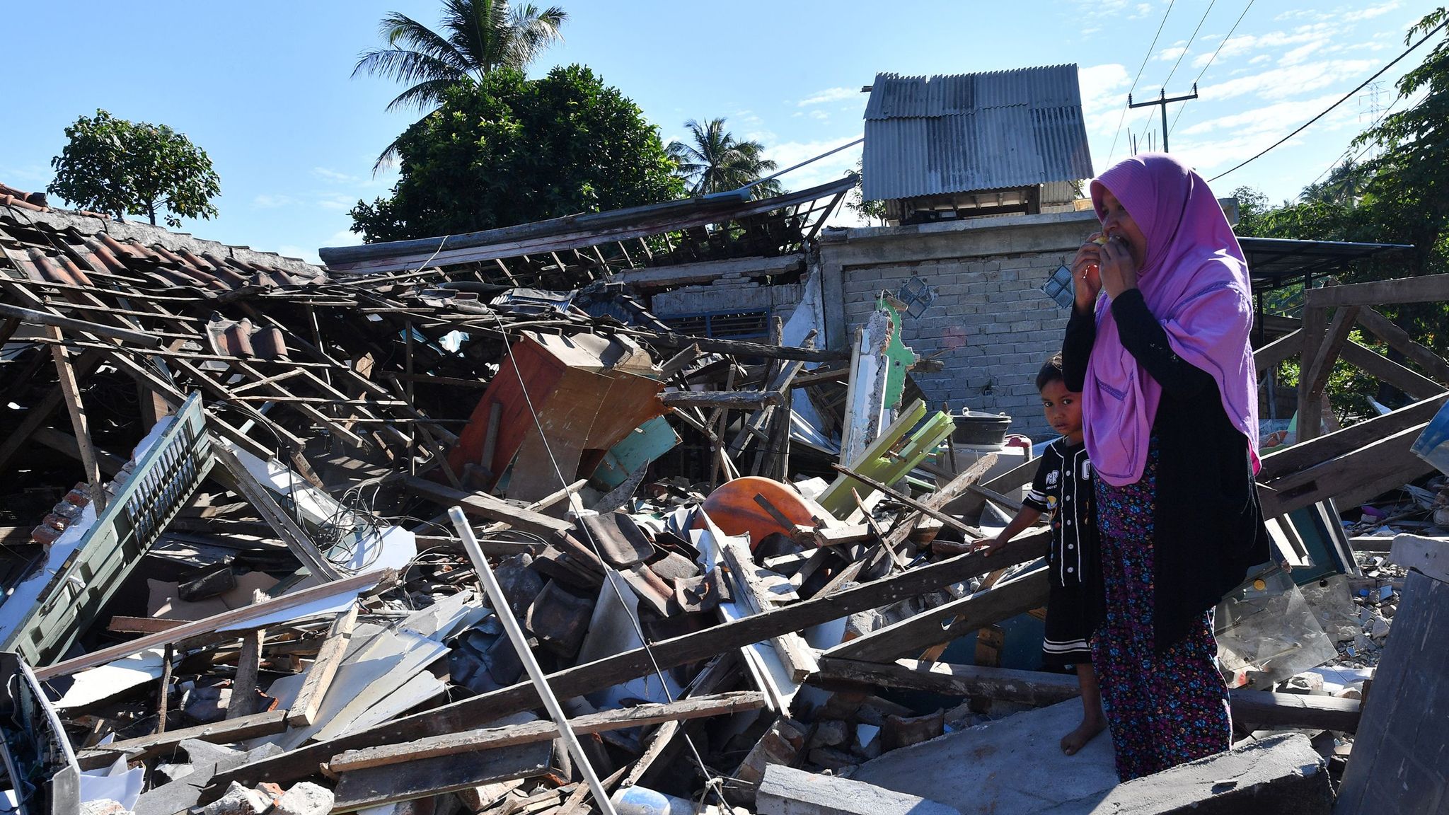 Lombok earthquake Victims 'buried alive' as number of dead rises to