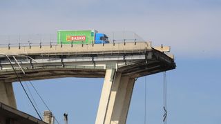 A truck stopped just short of the collapsed bridge in Genoa