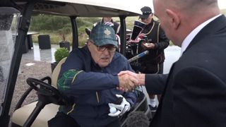 Donald Trump's lawyer Rudy Giuliani at the president's golf course near Aberdeen