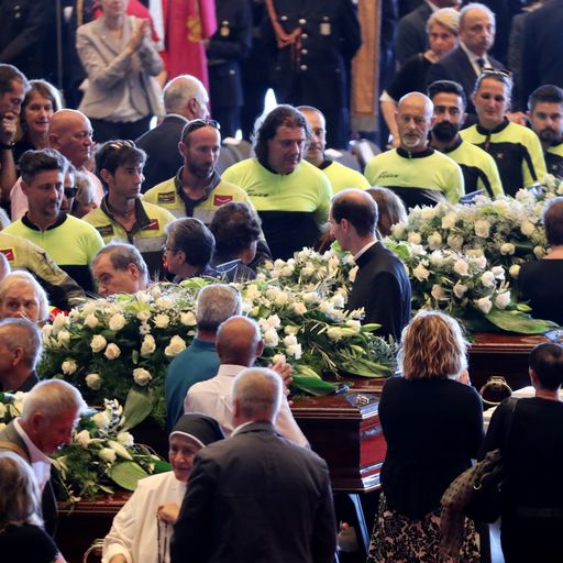 Victims' families blame former government at state funeral