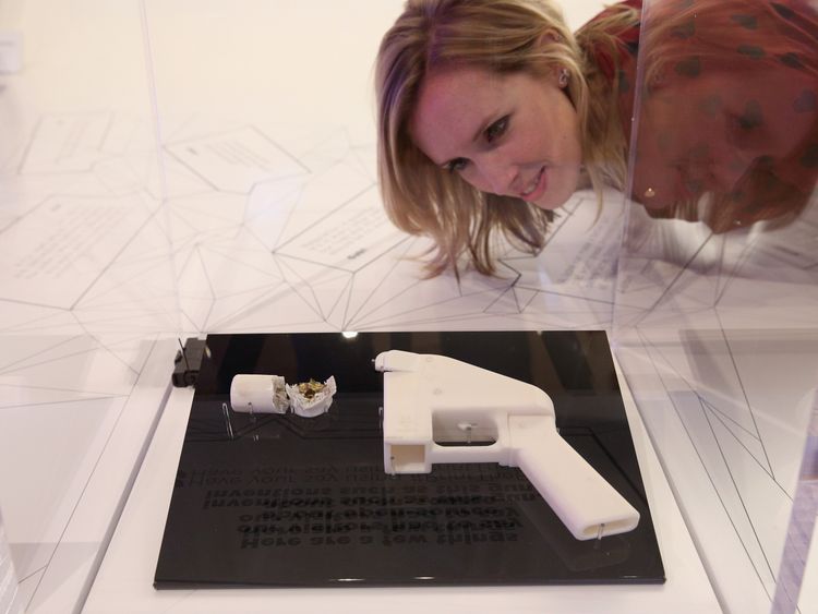 A 3D printed gun that has been fired is displayed at the Science Museum