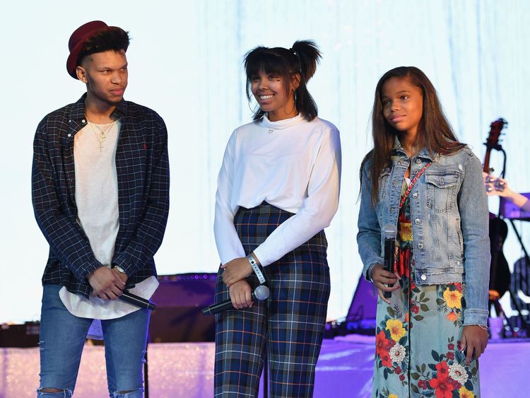 Grandchildren of Aretha Franklin (L-R) Jordan, Victorie and Gracie speak on stage during a tribute event