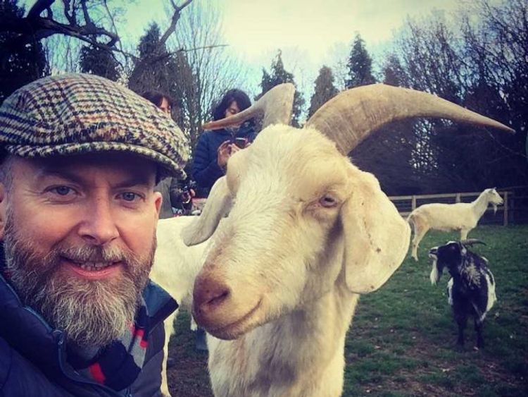 Dr Alan McElligott with goat - Credit Alan McElligott
