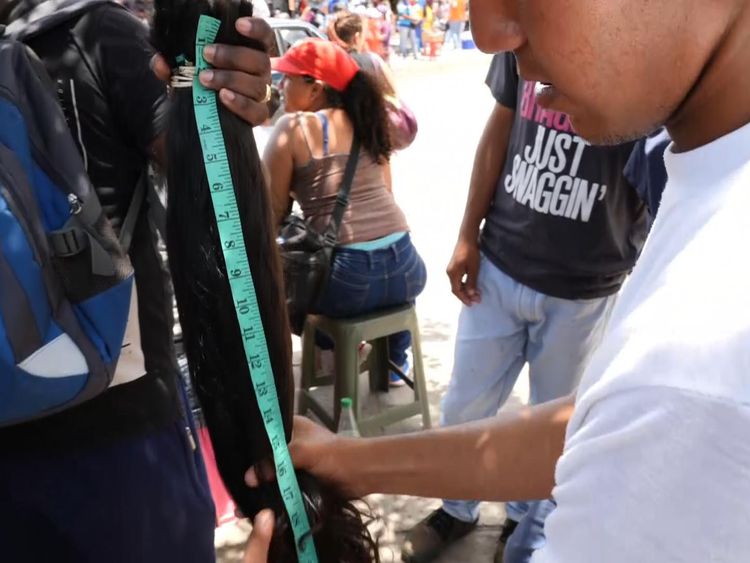 A length of Venezuelan hair can earn a woman 222,000 Colombian pesos ($75)