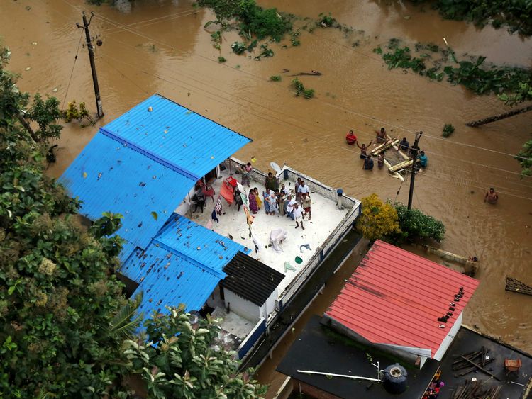 Many people have been seen of the roofs of buildings awaiting rescue 