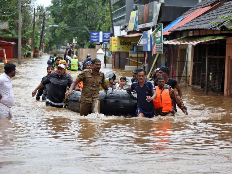 Boats and helicopters have been deployed in the Kerala rescue effort