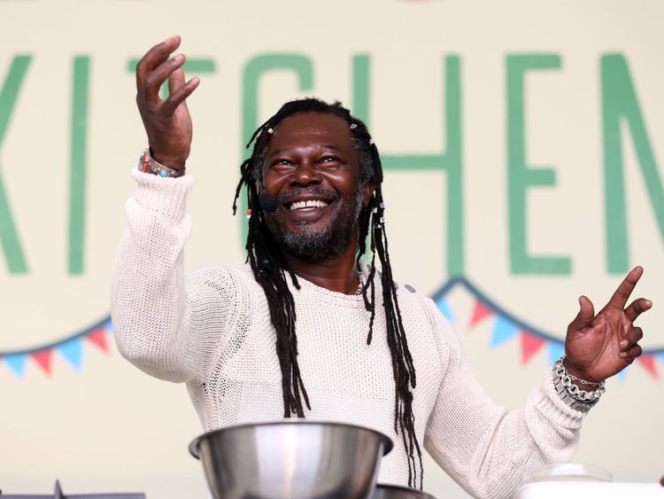 Levi Roots performs during a cooking demonstration at the Big Feastival held on the farm of Blur bassist Alex James&#39; at Kingham in the Cotswalds.

