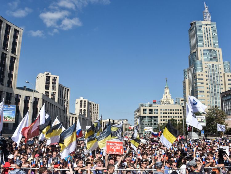 Opposition supporters attend a rally against the government&#39;s proposed reform hiking the pension age in Moscow in July