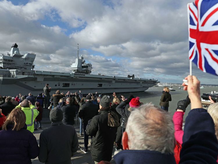 HMS Queen Elizabeth leaves Portsmouth Harbour in Hampshire to begin the next leg of her sea trials