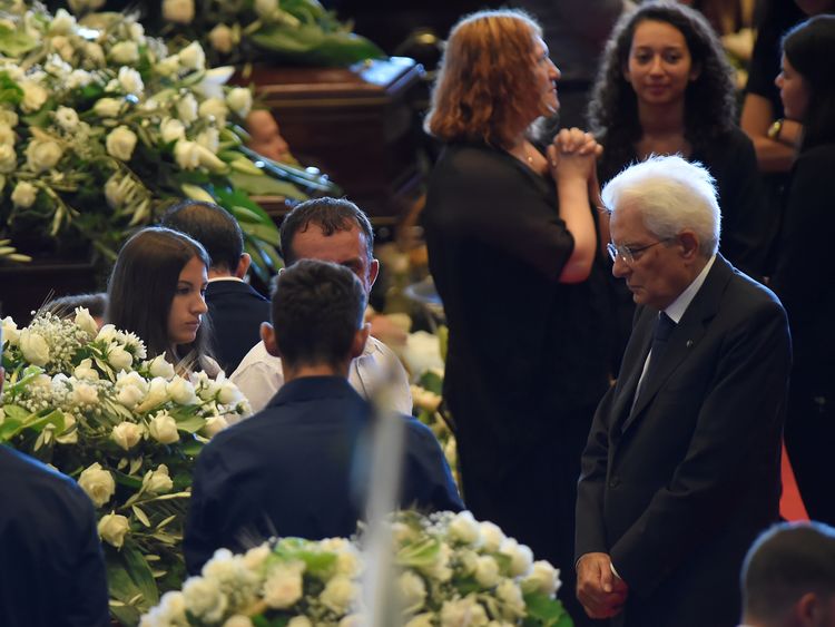 Italian president Sergio Mattarella was cheered as he entered the state funeral where he spoke to every victims&#39; family