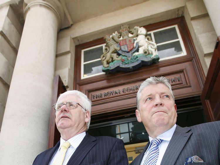 Stanley McComb (R) stood with another victim's relative Michael Gallagher (L) during a civil case against five accused men
