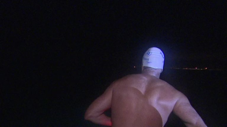 Lewis Pugh swims at night