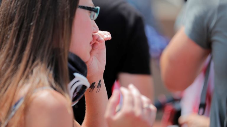 A woman with an SS tattoo was one of the 30 white nationalists at the rally