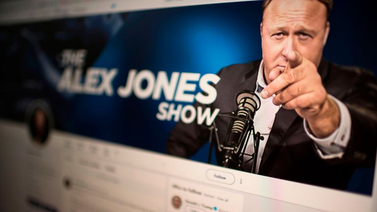 Picture showing a computer screen displaying the Twitter account of Far-right conspiracy theorist Alex Jones taken on August 15, 2018 in Washngton DC. - Far-right conspiracy theorist Alex Jones said his Twitter account had been suspended for a week, the latest online platform to take action against the activist. Twitter suspended the personal account of Jones, who operates the Infowars website that has disputed the veracity of the September 11 attacks, the Sandy Hook school massacre and other ev