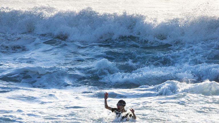 Dramatic rescue of drowning woman captured on camera | World News | Sky ...