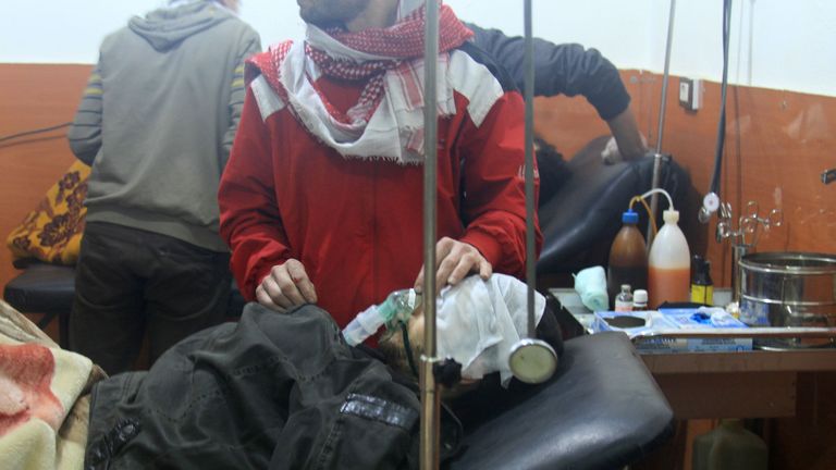 People receive treatment at a field hospital after an alleged poison gas attack by Regime troops in 2014
