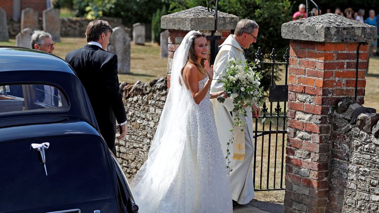 Bride Daisy Jenks arrives at the church for her wedding to Charlie van Straubenzee