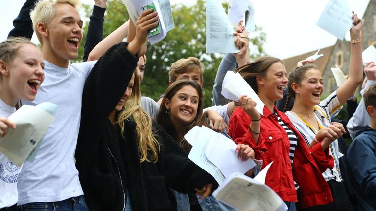 Students celebrate as they collect their GCSE results at Brighton College