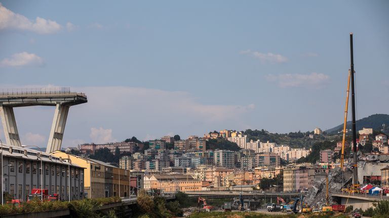GENOA, ITALY - AUGUST 19: A stretch of the Morandi Bridge stands days after a section of it collapsed on August 19, 2018 in Genoa, Italy. 43 people were killed after a large section of the Morandi highway bridge collapsed on August 14, 2018. Thousands attended a state funeral for 19 victims of the disaster yesterday while some families boycotted the event, blaming the government for failing to ensure that the bridge was safe. (Photo by Jack Taylor/Getty Images)