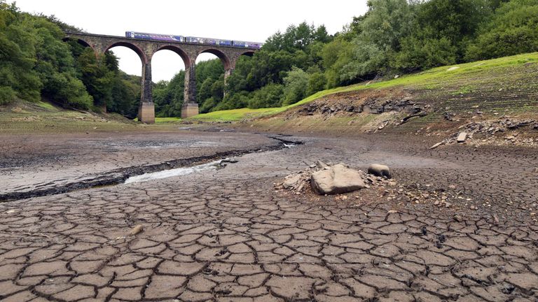 Part of the Wayoh Reservoir near Bolton has been left parched by the UK heatwave
