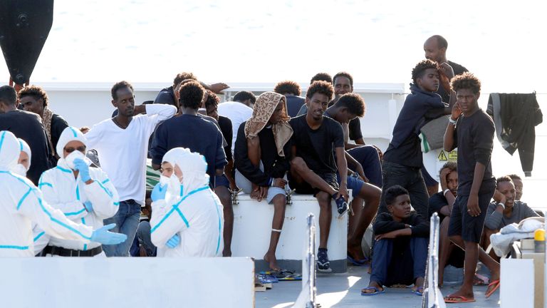 Migrants 'go on hunger strike' as Italian government refuses to accept ...