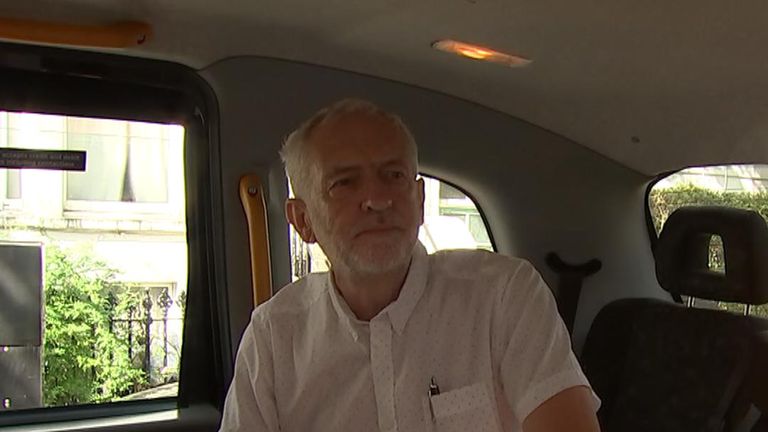 Jeremy Corbyn is brief with the press as he boards a taxi