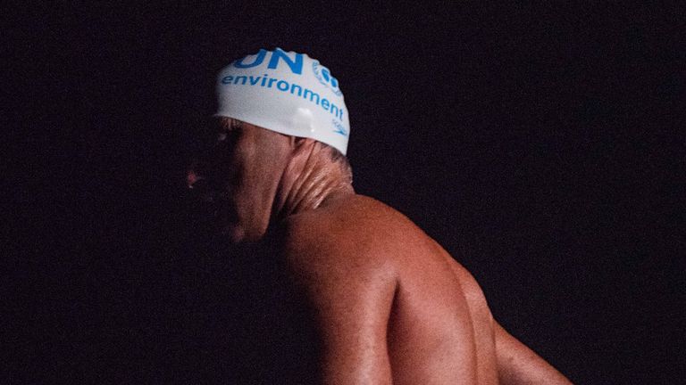 Renowned endurance swimmer and United Nation...s Environment Programme (UNEP)...s Patron of the Oceans, Lewis Pugh swims past Start Point, United Kingdom during The Long Swim campaign on 27 July 2018