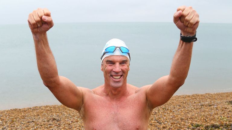 Lewis Pugh arrives at Shakespeare Beach to complete his "Long Swim" from Land&#39;s End to Dover