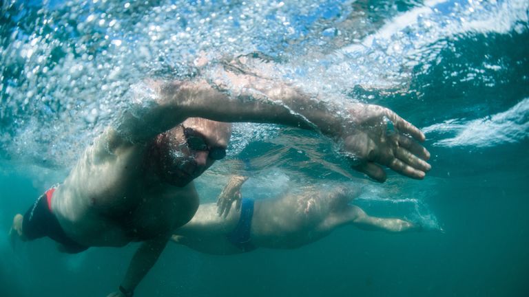 Sky News correspondent Thomas Moore joins Lewis for a swim 