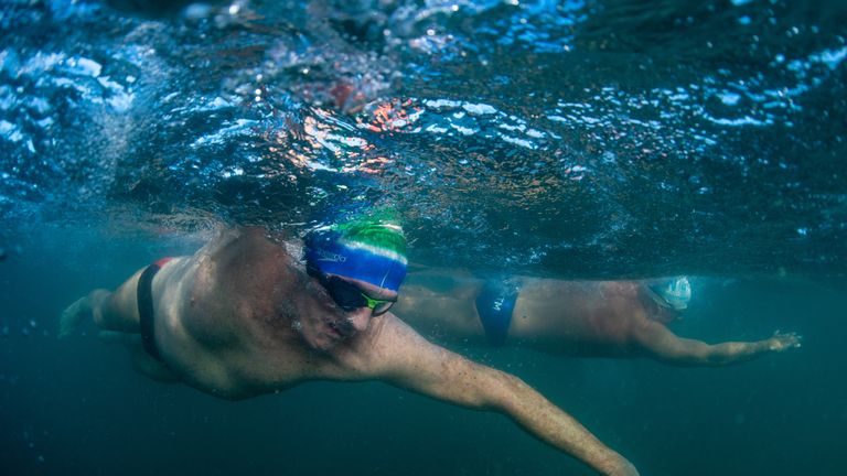 Lewis Pugh was joined in the water by his friend Otto Thaning