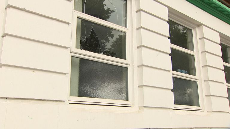 A broken window at the Masjid Qamarul Islam mosque
